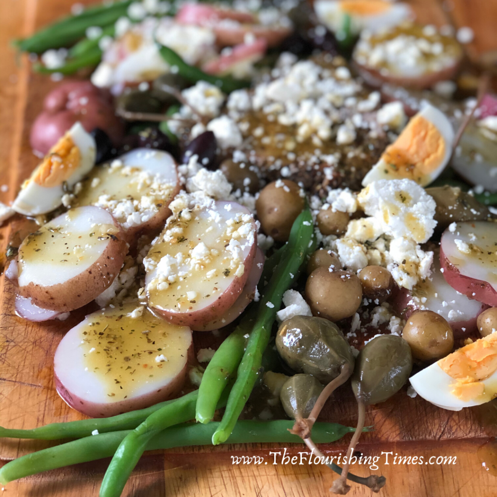 This is a charcuterie style platter of Salad Nicoise.